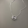 BOW IN CIRCLE NECKLACE