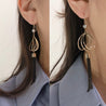 OVAL & TASSEL EARRING