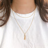 DOUBLE LAYERED TASSEL NECKLACE